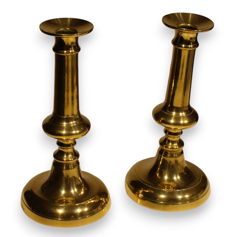 A pair of bronze candlesticks