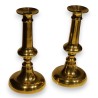 A pair of bronze candlesticks