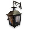 Lantern with a black wrought-iron bracket