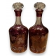 Paire de carafes "Aux raisins" en cristal rouge