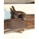 Pistolet à percussion à gâchette escamotable