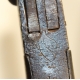 Pistolet à percussion à gâchette escamotable