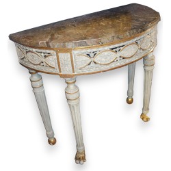 Half-moon console table by JEANJAQUET, with a marble top