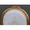 Fauteuil médaillon style Louis XVI doré
