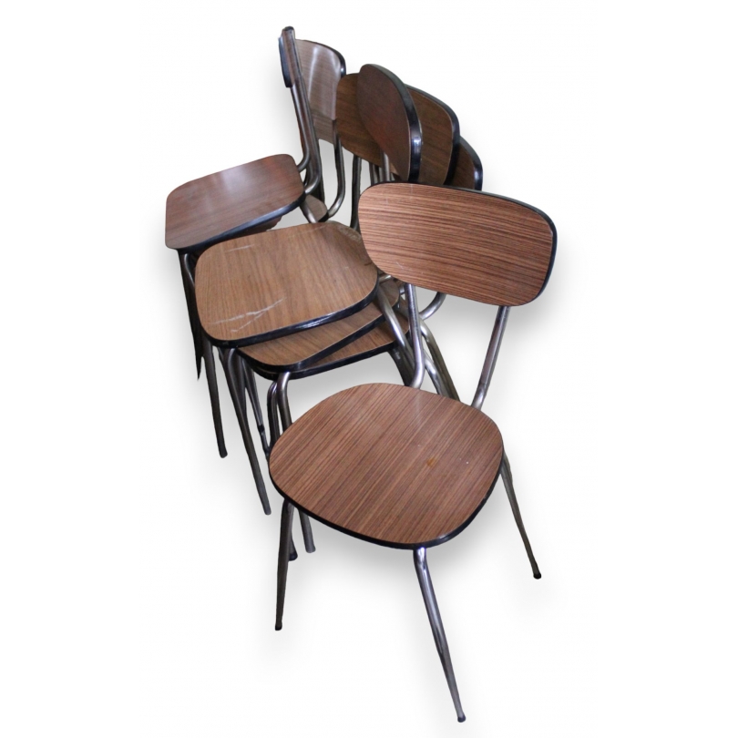 Suite de 7 chaises dépareillées en formica