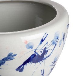 Blue and white plant pot with a crayfish design