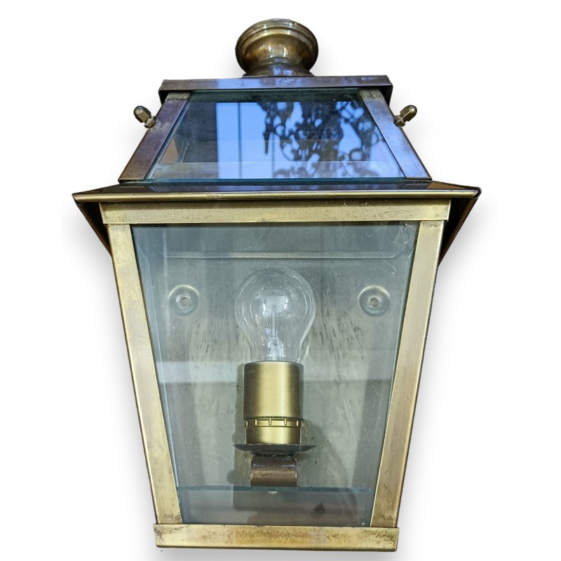 Brass wall lamp with a glass top