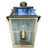 Brass wall lamp with a glass top