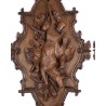 Paire de panoplies en noyer sculpté