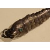 Poisson articulé en argent, yeux verts
