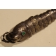 Poisson articulé en argent, yeux verts