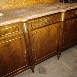 Louis XVI-style sideboard with a beige marble top