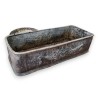 Lead planter with floral decoration