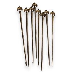 Suite de 8 piques en métal argenté
