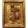 Paire de portaits en bois sculpté doré