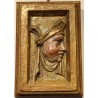 Paire de portaits en bois sculpté doré
