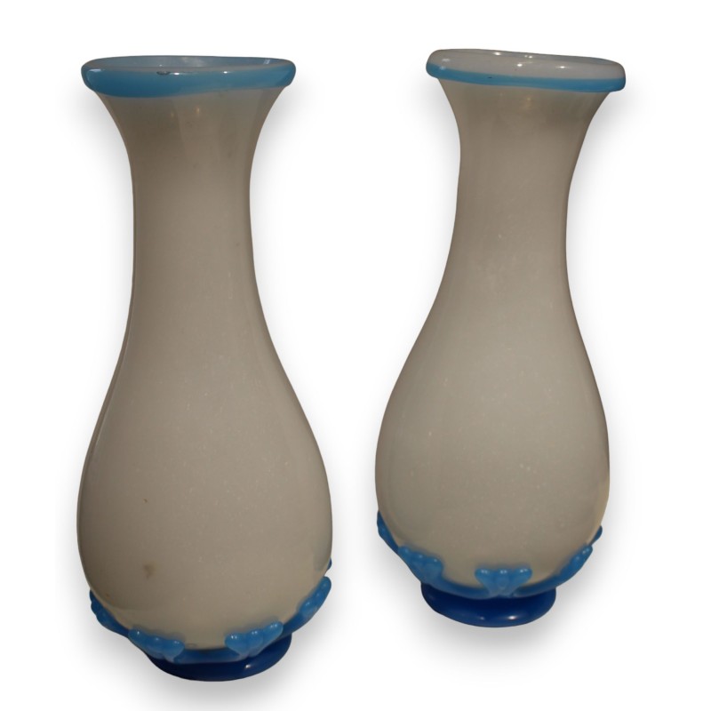 A pair of white and blue opaline vases