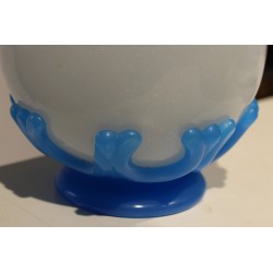A pair of white and blue opaline vases