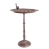 Brown cast-iron bird bath