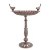 Brown cast-iron bird bath