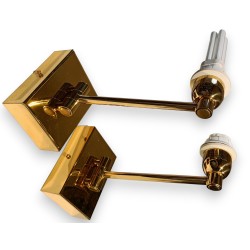 A pair of wall lights with arms by MLE