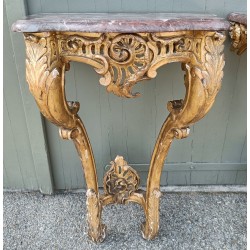 A pair of Louis XV side tables in gilded wood