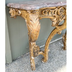 A pair of Louis XV side tables in gilded wood