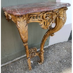 A pair of Louis XV side tables in gilded wood