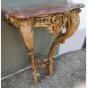 A pair of Louis XV side tables in gilded wood