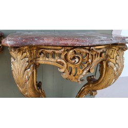 A pair of Louis XV side tables in gilded wood