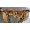A pair of Louis XV side tables in gilded wood