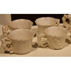 Set of 10 carved white jade cups