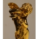 Bronze doré "Cupidon versant sur un coeur"