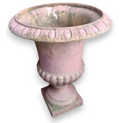 Pair of pink cast-iron urns