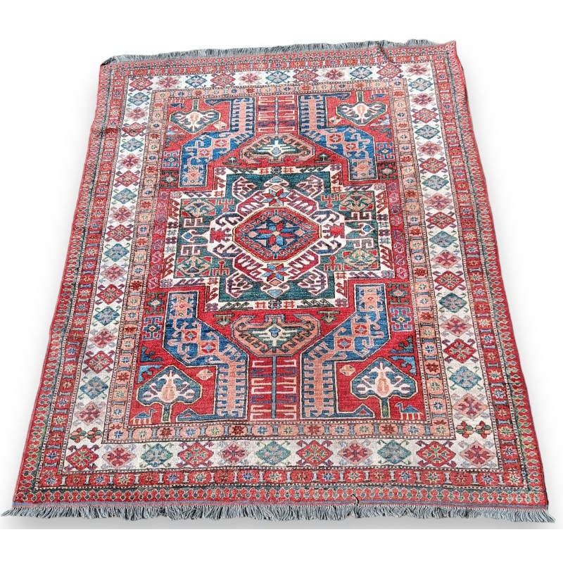 Kazak carpet with a red background
