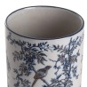 Round porcelain plant pot with a bird design
