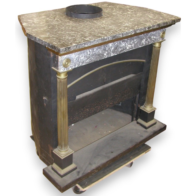 Parisian Empire-style fireplace with columns. At  Moinat SA  - Antiques and home décor