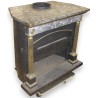 Parisian Empire-style fireplace with columns. At  Moinat SA  - Antiques and home décor