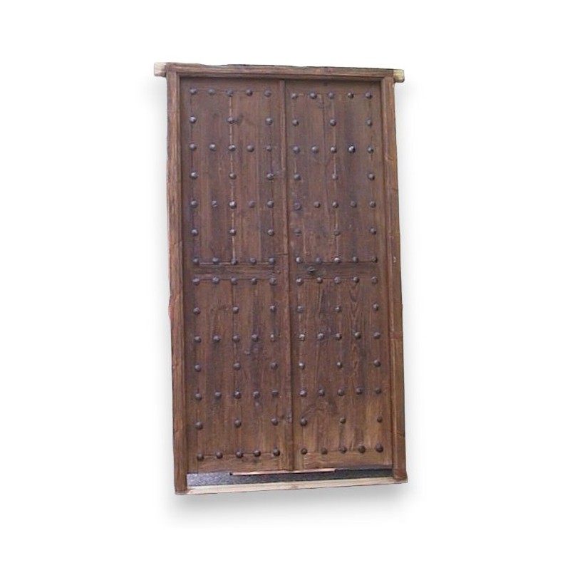 Studded door. at  Moinat SA  - Antiques and home décor
