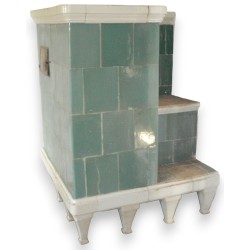 Directoire-style stove with green and white tiles. At  Moinat SA  - Antiques and home décor