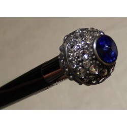 Walking stick with a round, gold-coloured knob set with an aquamarine