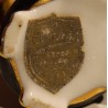 Chinois assis en porcelaine