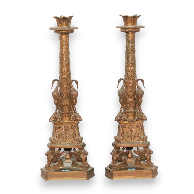 A pair of bronze candlesticks signed B. BOSCHETTI