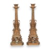 A pair of bronze candlesticks signed B. BOSCHETTI