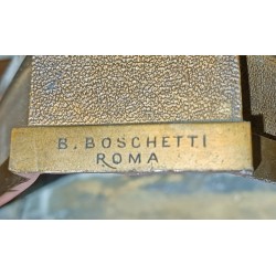 A pair of bronze candlesticks signed B. BOSCHETTI