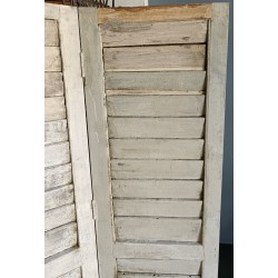 Screen designed to look like shutters