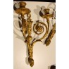 Paire d'appliques style Louis XVI à deux lumières