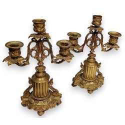 Pair of Napoleon III three-candle candlesticks