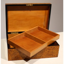 Box designed to look like a magnifying glass