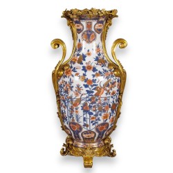Vase \"Grues\" en porcelaine et bronze